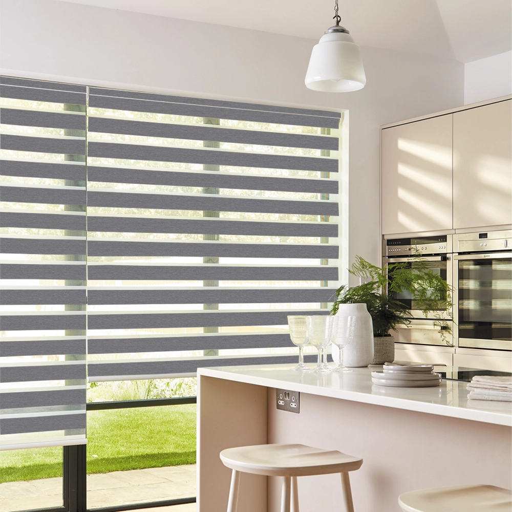 Lustre Charcoal Blackout Day and Night Roller Blinds providing room darkening and privacy for modern homes.