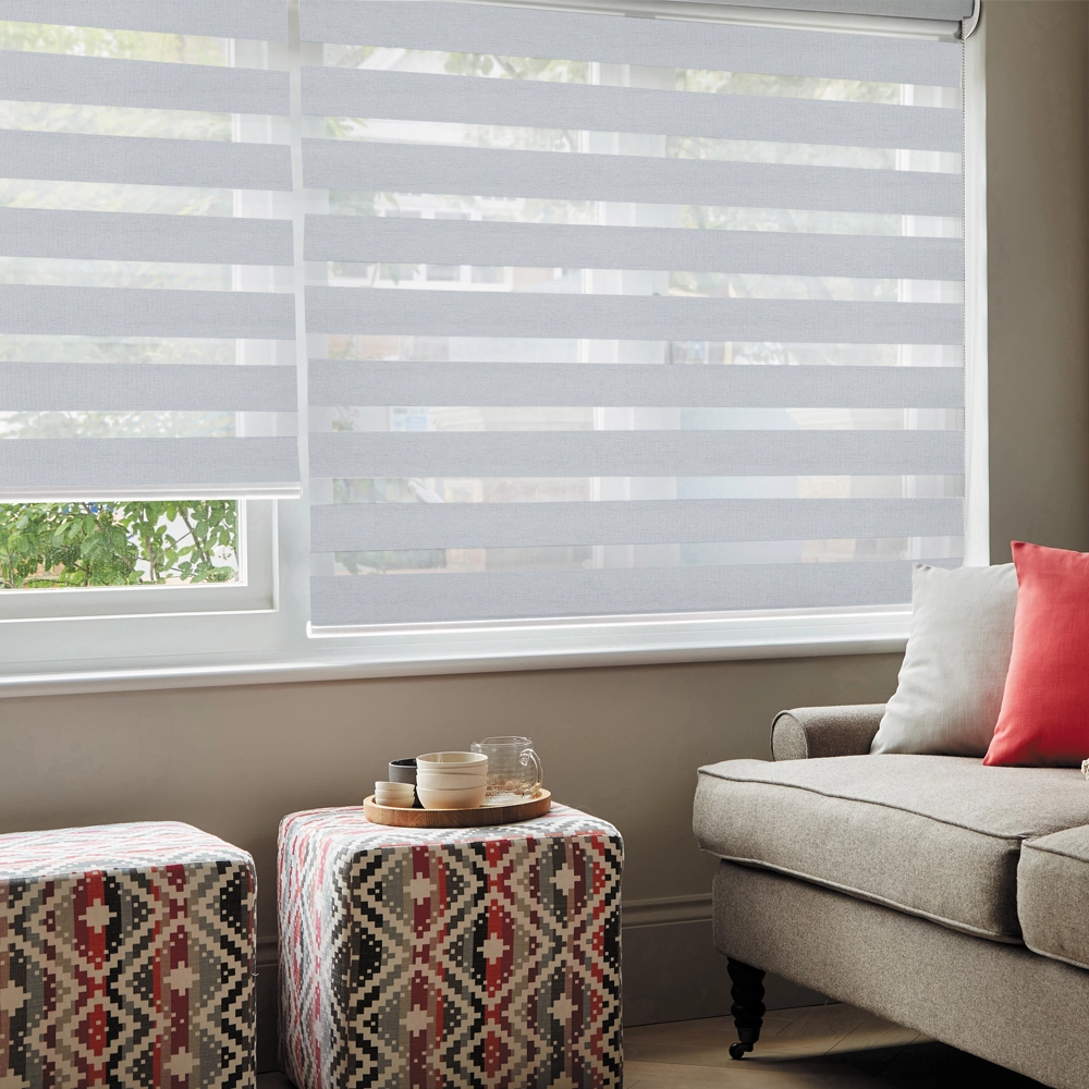 Luxury Lustre Ice Blackout Day and Night Blinds featuring premium blackout fabric, enhanced room darkening and elegant sheer voile bands.