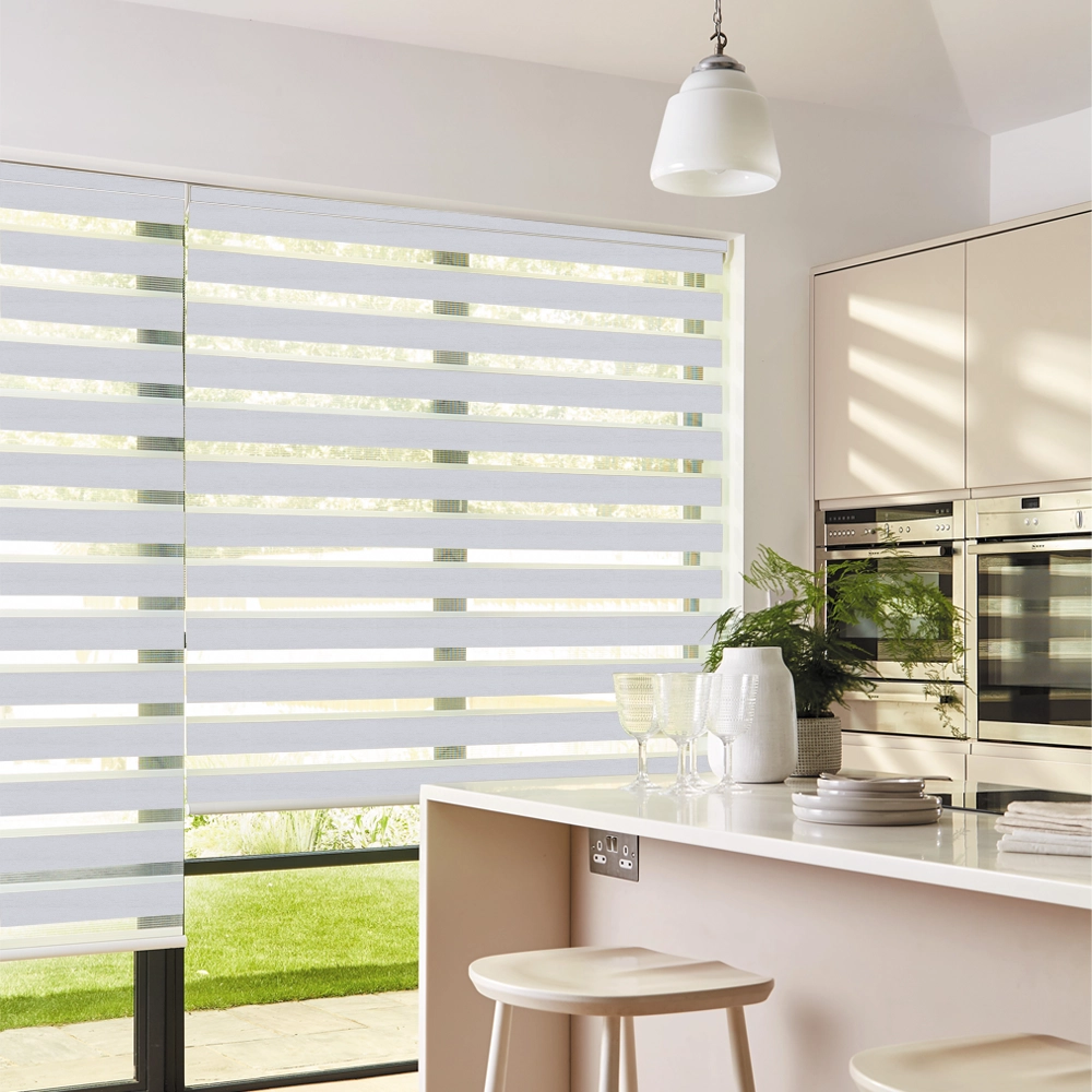 Lustre Ice Blackout Day and Night Roller Blinds providing room darkening and privacy for modern homes.