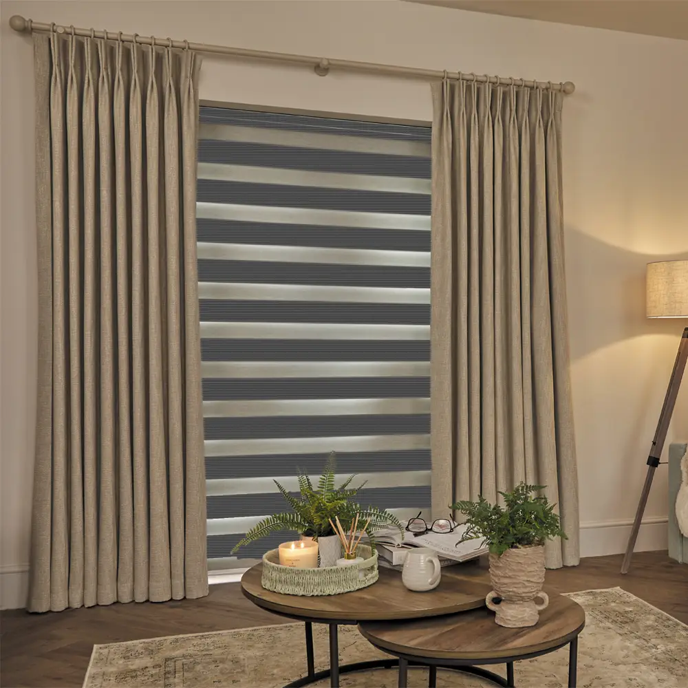 Made to measure Verve Graphite Textured Day and Night Blinds with alternating textured fabric and sheer voile bands.