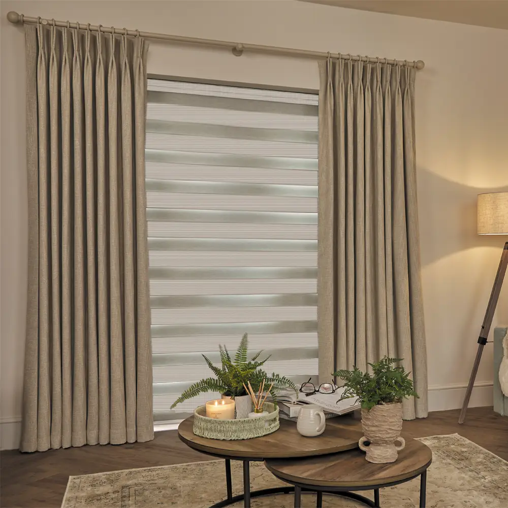 Made to measure Verve Light Beige Textured Day and Night Blinds with alternating textured fabric and sheer voile bands.