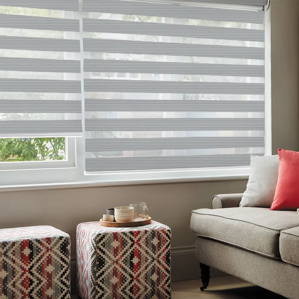Verve Silver Grey Textured Day and Night Blinds in a contemporary living room with elegant textured fabric styling.