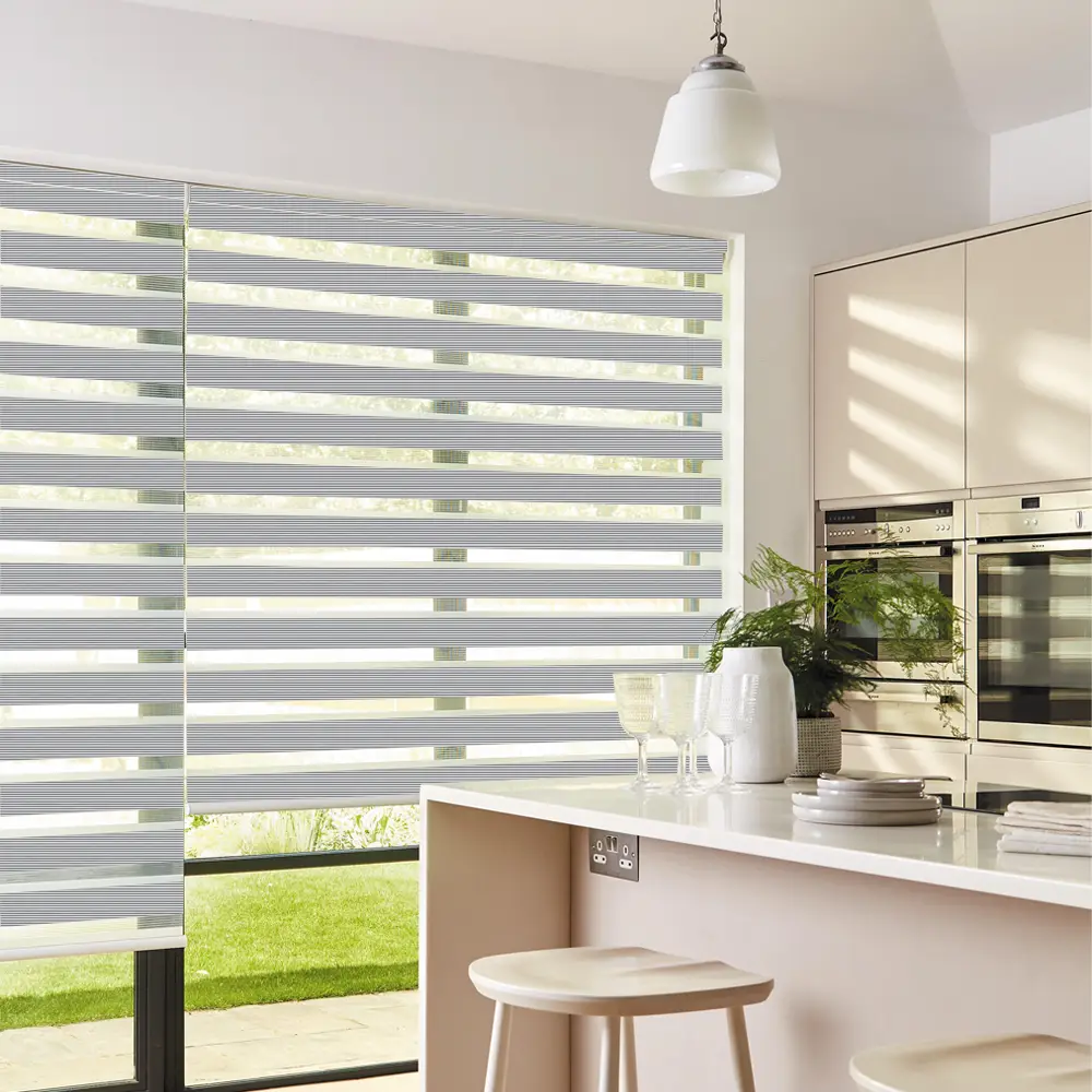 Verve Silver Grey Day and Night Roller Blinds fitted to a stylish residential window.