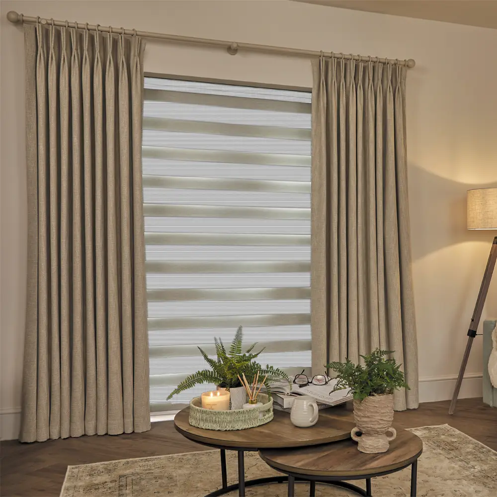 Made to measure Verve Silver Grey Textured Day and Night Blinds with alternating textured fabric and sheer voile bands.