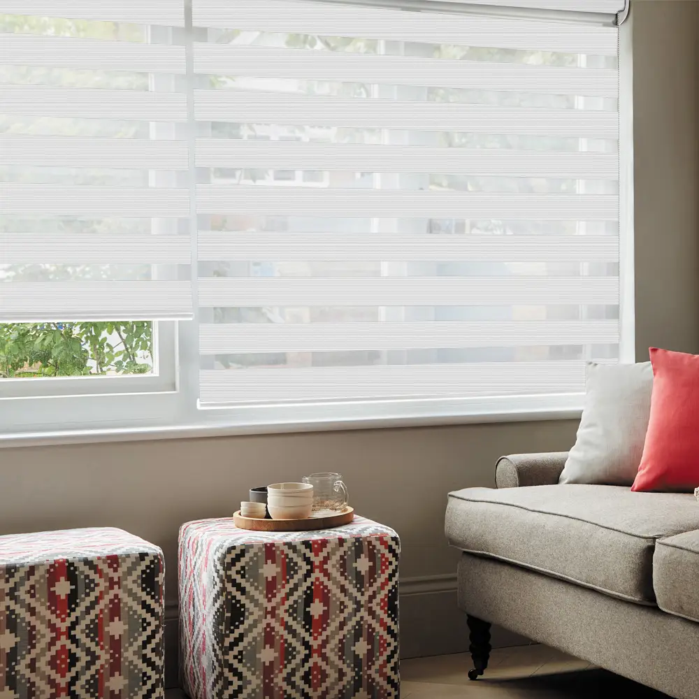 Verve White Textured Day and Night Blinds in a contemporary living room with elegant textured fabric styling.