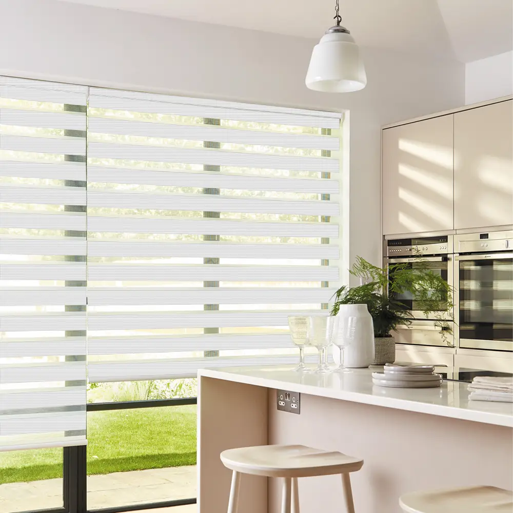 Verve White Day and Night Roller Blinds fitted to a stylish residential window.