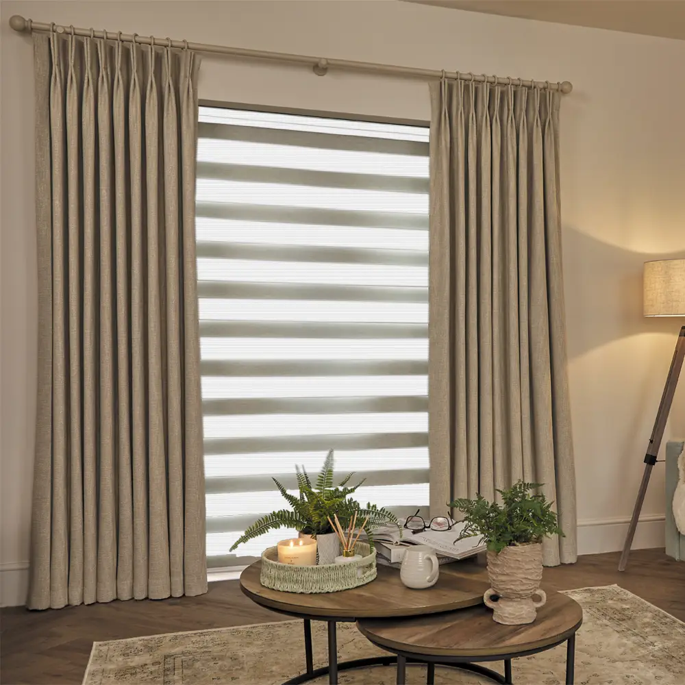 Made to measure Verve White Textured Day and Night Blinds with alternating textured fabric and sheer voile bands.