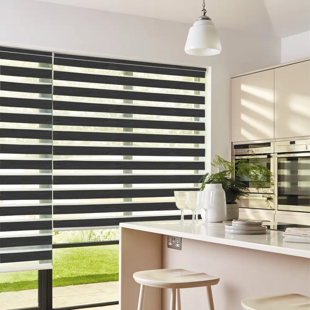 Vision Black Day and Night Roller Blinds fitted to a stylish residential window.