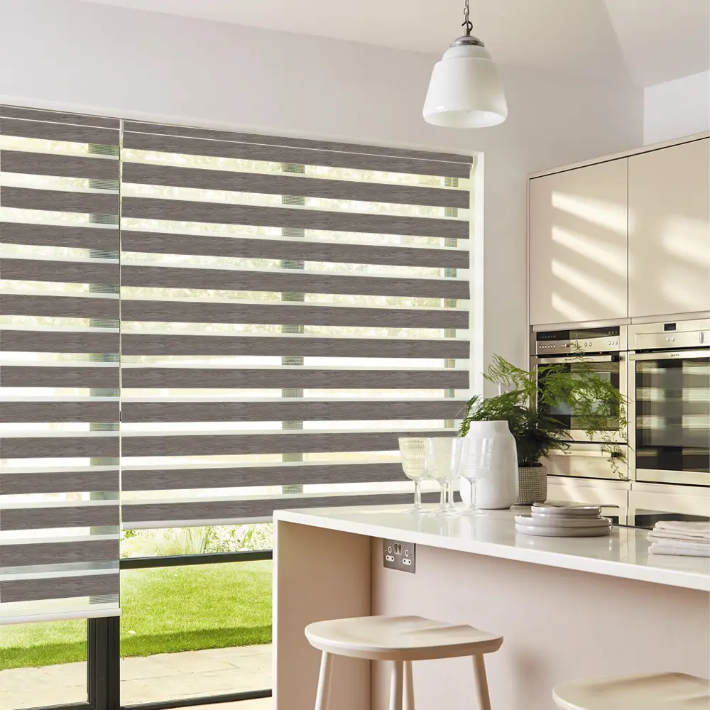 Vision Taupe Day and Night Roller Blinds fitted to a stylish residential window.