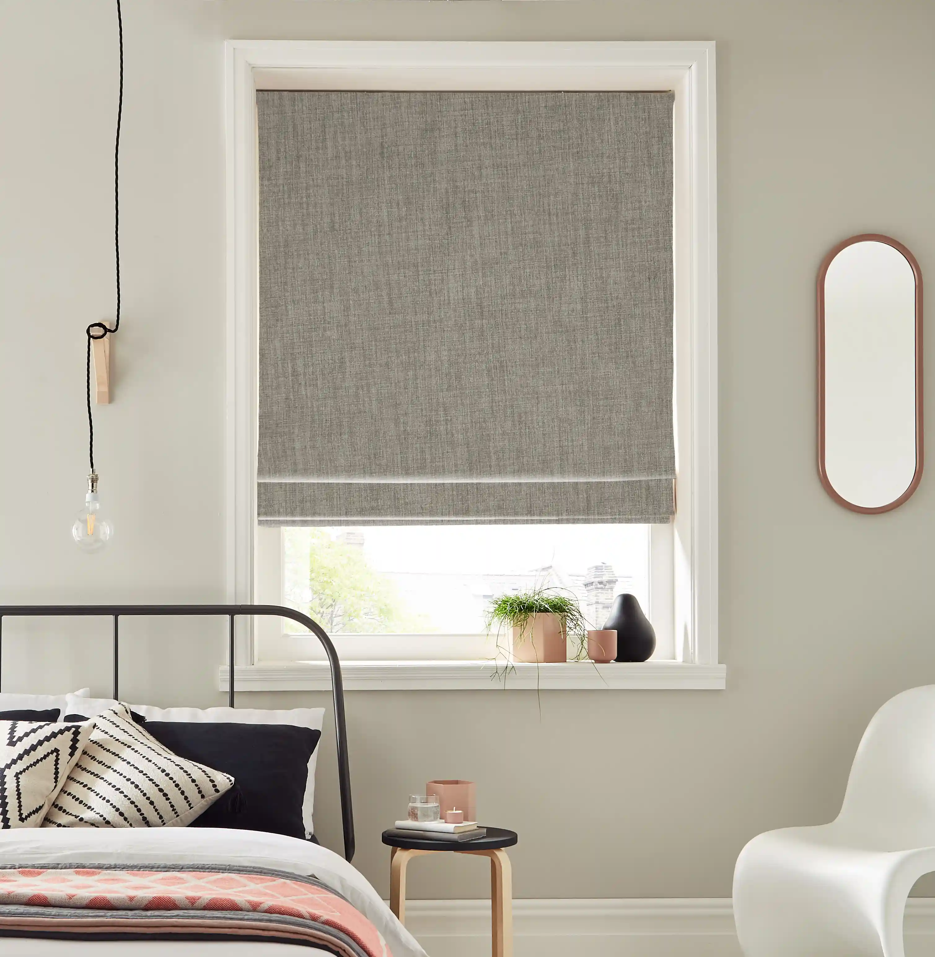 Roman Blinds for Small Windows in Taunton—Enhance your small windows with Roman blinds designed to provide both privacy and elegance.